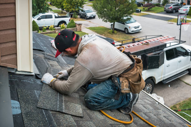 Professional Roof Repair technician working in Hood, VA